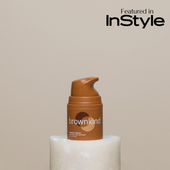 Bottle of Brownkind Vitamin C serum w/ Featured in Instyle logo